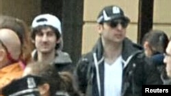 Tamerlan (right) and Dzokhar Tsarnaev are seen in a photo released by the FBI, dating from when they were being sought for questioning for the Boston Marathon bombings. 