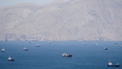 The US will 'guide' ships from 'neutral' countries that have been stranded around the Strait of Hormuz, President Donald Trump said.