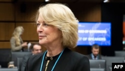 File - US representative to the International Atomic Energy Agency (IAEA), Jackie Wolcott arrives to part in a meeting of IAEA Board of Governors on November 22, 2018