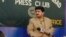 FILE: Hamid Mir recoded his television show outside the Islamabad Press Club to protest a ban by military dictator Pervez Musharraf in 2007.