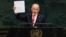 Israel's Prime Minister Benjamin Netanyahu holds up a Starlink device as he speaks during the 81st UN General Assembly in New York, on September 24, 2026. 