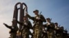România nu va reintroduce serviciul militar obligatoriu, dar are nevoie de mai mulți rezerviști