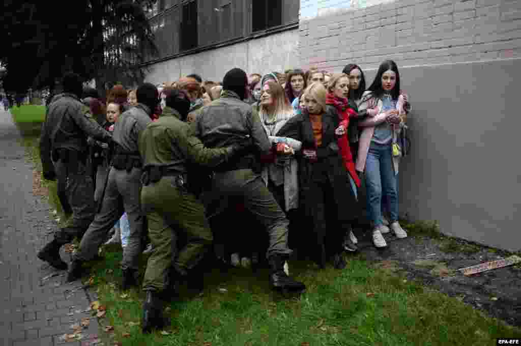 Belarusian women activists resist police attempting to detain them as they gathered to support opposition leader Maryya Kalesnikava in Minsk on September 8. Kalesnikava has said the authorities put a bag over her head and threatened to kill her when they tried to forcibly deport her earlier this week. Kalesnikava was snatched from the streets of Minsk on September 7 by masked men along with two staffers. When they arrived in a no-man&#39;s land between the countries, Kalesnikava ripped her passport into small pieces to make it impossible for the authorities to expel her. (epa-EFE/Stringer)