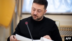 Președintele Ucrainei, Volodimir Zelenski, la o conferință de presă cu jurnaliștii la Kiev, pe 23 decembrie.