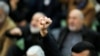 Iran -- An Iranian worshipper raises his fist during the friday prayers at the Imam Khomeini mosque in Tehran, on January 5, 2018