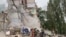 Russian Strike On Kyiv Kills At Least 8 GRAB