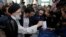 WATCH: Rohani, Raisi Cast Ballots In Iranian Presidential Election