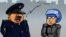 Azerbaijan - cartoon on crackdown by goverenment forces in the village Nardaran near Baku