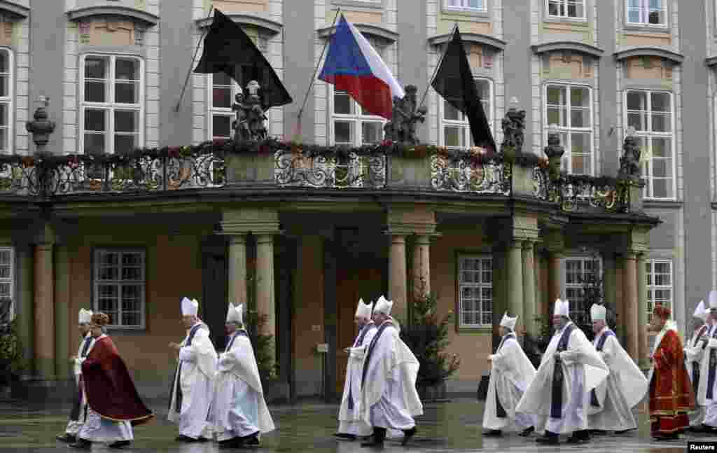 Czech Republic - Catholic priests walk in line to attend the funeral ceremony for the late former President Vaclav Havel at Prague Castle's St. Vitus Cathedral, 23Dec2011