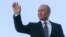 Russian President Vladimir Putin waves to the public after his fourth inauguration as president on May 7. 