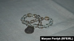 Дукач в намисті