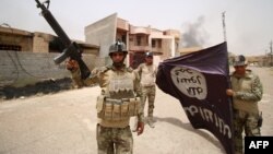 Yragyň hökümete tarapdar güýçleriniň "Yslam döwleti" atly toparyň baýdagyny ele salan pursady.