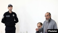 Armenia - Archbishop Mikael Ajapahian speaks during his trial in Yerevan, September 23, 2025.