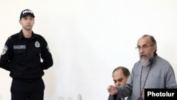 Armenia- Archbishop Mikayel Ajapahian speaks during his trial in Yerevan, September 23, 2025.