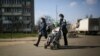 Ukraine -- Coronavirus, family in medical mask near subway station "Hero of the Dniper" in Kyiv, 18Mar2020