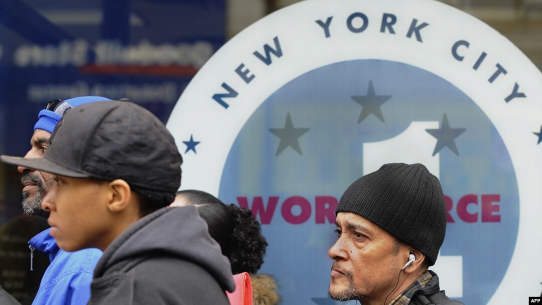 People wait to apply for jobs outside the Department of Labor in the Bronx, New York, earlier this year.