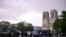 French police gather at the entrance to Notre-Dame Cathedral in Paris following an attack on an officer on June 6.