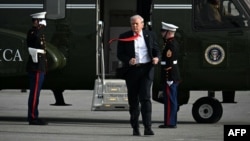 US President Donald Trump steps off Marine One after landing at Ocala International Airport in Florida, where he spoke at The Villages retirement community on May 1.