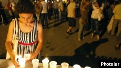 Armenia - A candlelight vigil outside the Harsnakar restaurant in Yerevan, 7Aug2012.