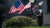 A U.S. Secret Service agent stands guard at the White House, which went into lockdown after a shooting incident on March 28.