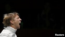 Николай Ковалев празднует победу