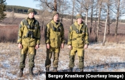 Sergei Krasikov works with his father and brother at the reserve.