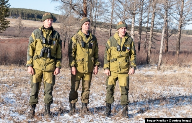 Sergei Krasikov works with his father and brother at the reserve.