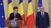Președintele Nicușor Dan (stânga) și premierul desemnat Ilie Bolojan