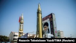 FILE PHOTO: A display featuring missiles and a portrait of Iran's Supreme Leader Ayatollah Ali Khamenei is seen at Baharestan Square in Tehran, Iran September 27, 2017