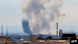 Smoke rises following strikes on Tehran on April 7. 
