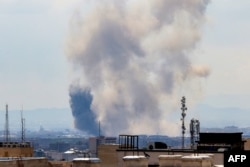 Smoke rises following strikes on Tehran on April 7.