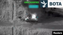 Sulmet ajrore amerikane duke goditur një makinë në Iran. 