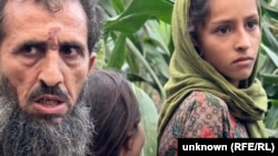 Wazir Khan (left) lost 10 family members in an earthquake in eastern Afghanistan on August 31. 