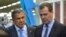 Russian Prime Minister Dmitry Medvedev (right) and Tatar President Rustam Minnikhanov have engaged in a war of words over the order to extract more revenue from Russia's regions.