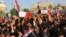 مراسم خاکسپاری کشته شدگان اعتراضات در کربلا