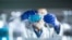 Generic — Senior male researcher carrying out scientific research in a lab