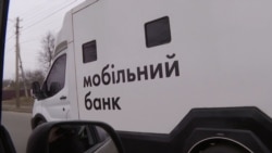 Ukraine's Mobile Frontline Bank Dodges Shells To Deliver Cash 