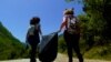 Kosovo: Volunteers picking up trash in Rugova