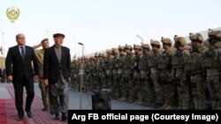 FILE: Afghan President Ashraf Ghani inspecting an Afghan National Army guard of honor.