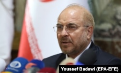 Parliament speaker Mohammad Baqer Qalibaf speaks during a press conference in Damascus in July 2021.