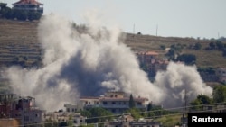 Smoke billows from southern Lebanon following an Israeli strike on June 19.