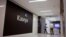 Staff enter the headquarters of information technology firm Kaseya in Miami.