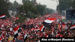 Supporters of Iraqi Shi'ite cleric Moqtada al-Sadr protest against what they say is U.S. presence and violations in Iraq, during a demonstration in Baghdad, Iraq January 24, 2020. 