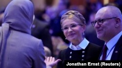 Former Ukrainian Prime Minister Yulia Tymoshenko (center) attends the National Prayer Breakfast in Washington, D.C., on February 8.