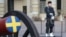 A Swedish soldier stands guard next to a ceremonial cannon in the courtyard of the Royal Palace in Stockholm on February 25.