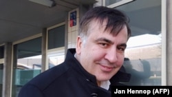 Mikheil Saakashvili stands in front of the Immigration and Naturalization offices in Rotterdam after his arrival in the Netherlands on February 14.