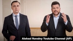 In a video released in April 2021, Ivan Zhdanov (left) and Leonid Volkov address supporters of imprisoned Russian opposition leader Aleksei Navalny.