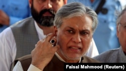 Pakistani Finance Minister Ishaq Dar is seen after a party meeting in Islamabad on September 26.