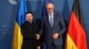 Ukrainian President Volodymyr Zelenskyy (left) and German Chancellor Friedrich Merz shake hands prior to bilateral talks during the 62nd Munich Security Conference on February 13.