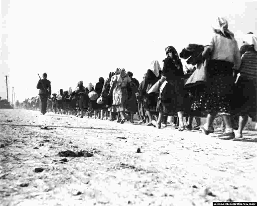 Mainly Bosnian Serb women and children escorted on their way to the Stara Gradisca concentration camp in 1941.